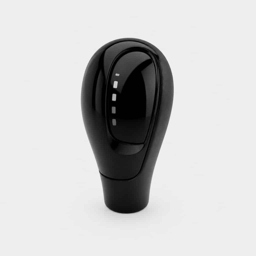 Pommeau de sélecteur pour boîte automatique présenté seul sur fond clair