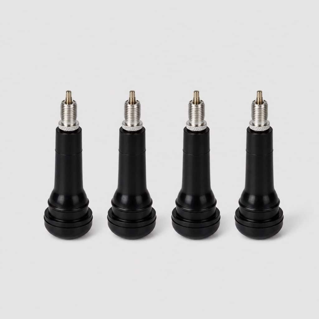 Jeu de quatre valves de pneu en caoutchouc